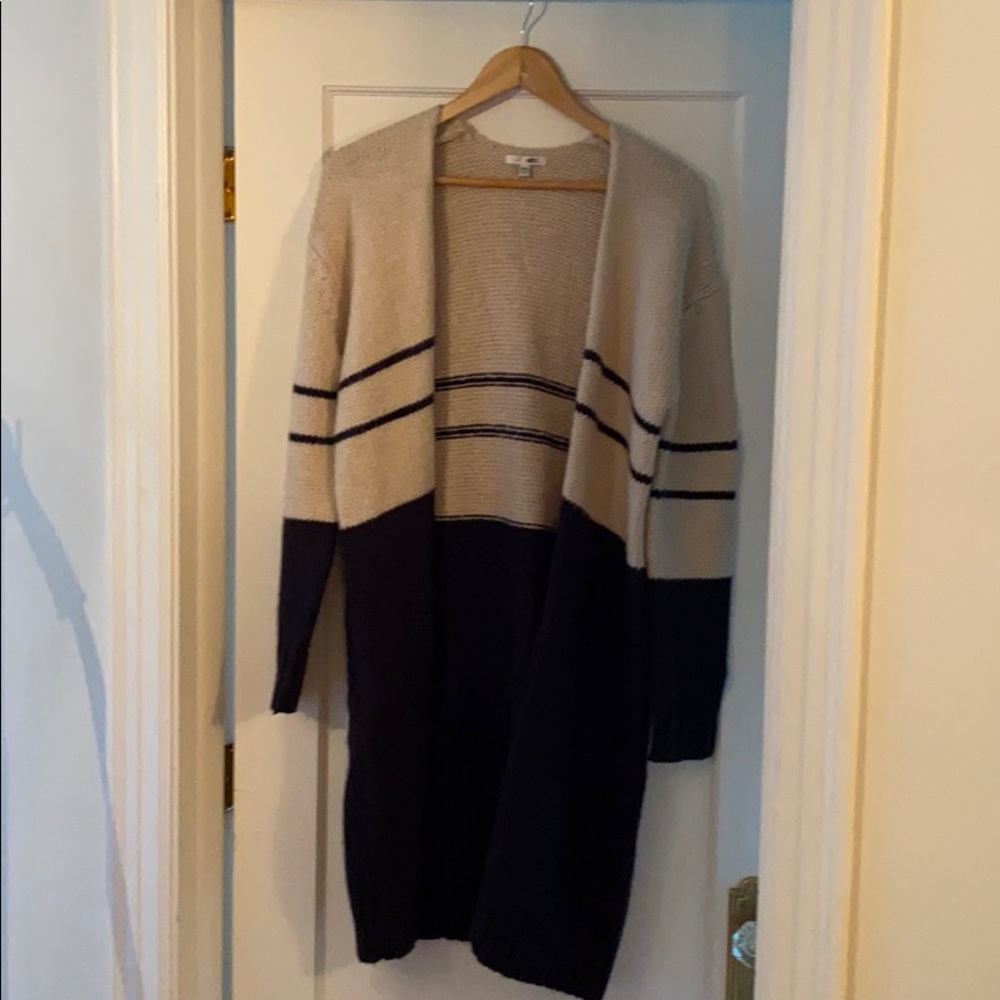 Knee length, striped wool sweater